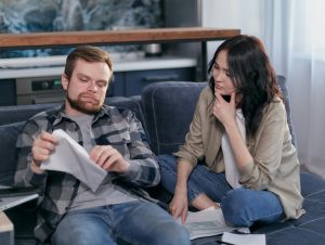 lady going through bank statements with partner